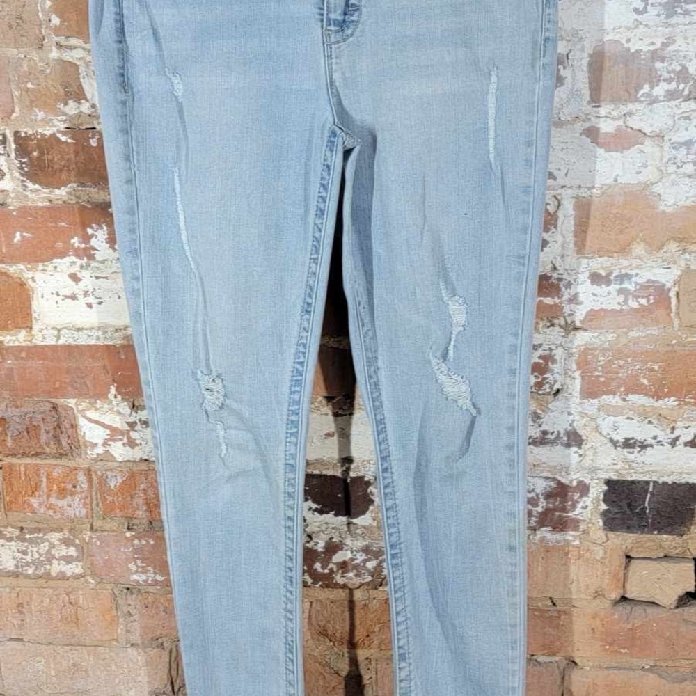 Light Blue Skinny Jeans with Distressed Details